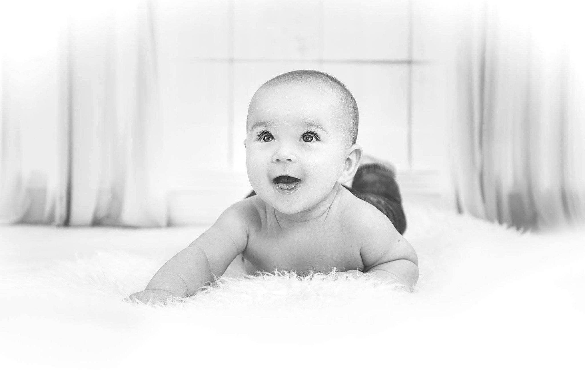 Aleksander joined the competition — help win amazing prizes! baby, black, black_and_white, child, eye, face, facial_expression, head, person, photograph, photography, portrait, portrait_photography, product, skin, smile, snapshot, stock_photography, toddler, tummy_time
