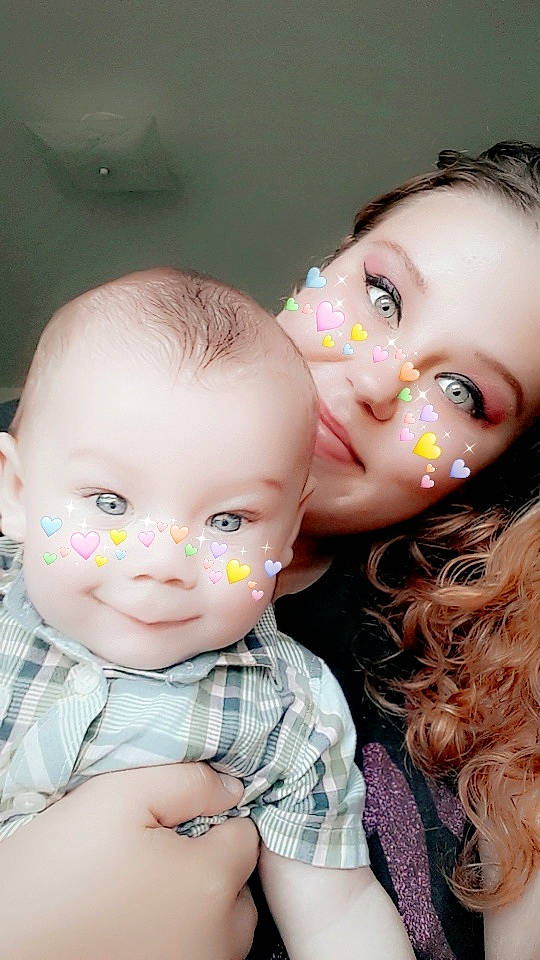 Dezmon is registered to the contest to win money with this photo: baby, brown_hair, cheek, child, doll, eye, eyelash, face, forehead, head, interaction, iris, lip, mouth, nose, person, pink, skin, smile, toddler