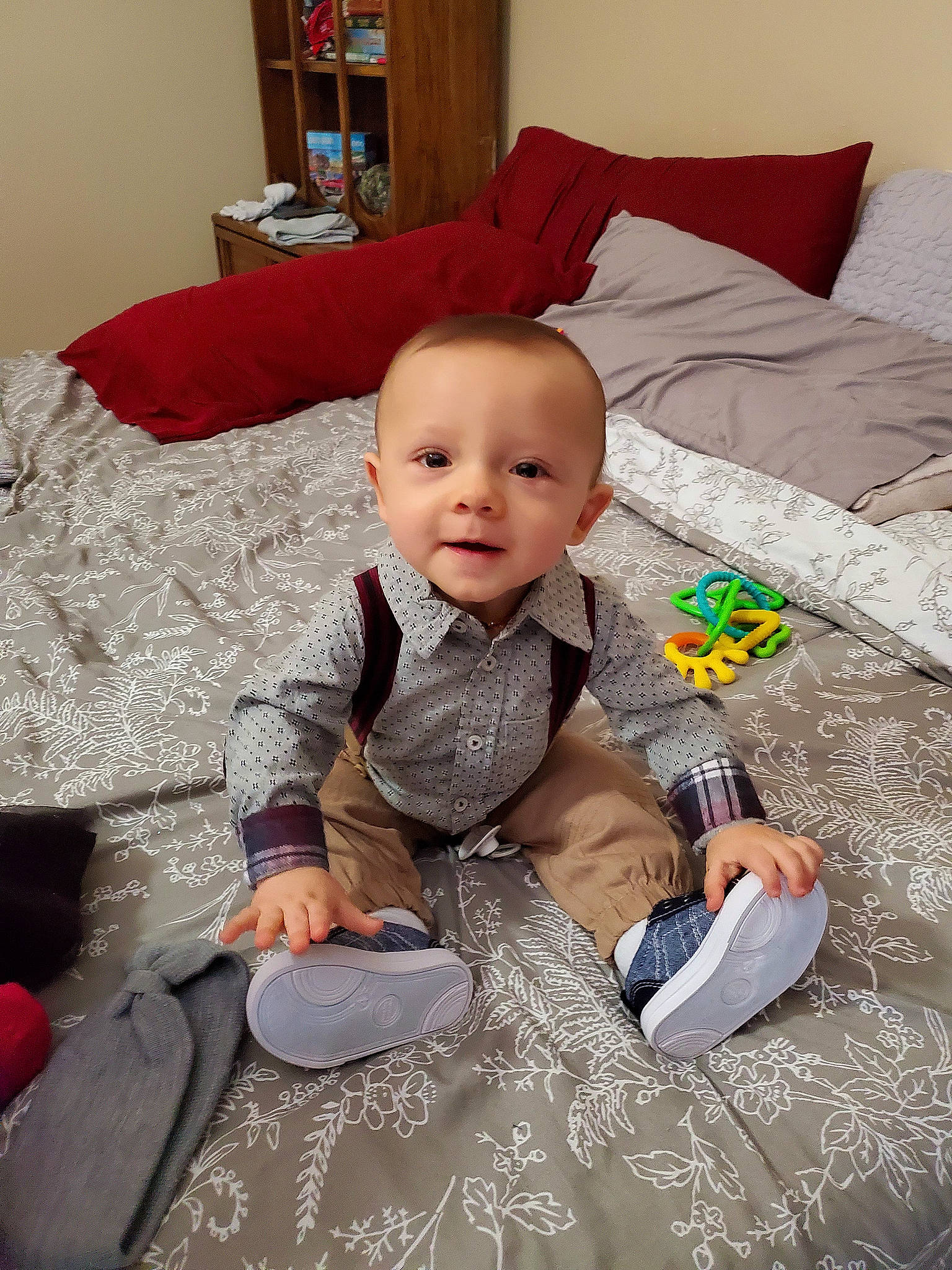 Xander joined the competition — help win amazing prizes! baby, baby_toddler_clothing, child, comfort, couch, eye, face, flooring, happy, head, lap, linens, pattern, person, product, shelf, sitting, sleeve, smile, textile