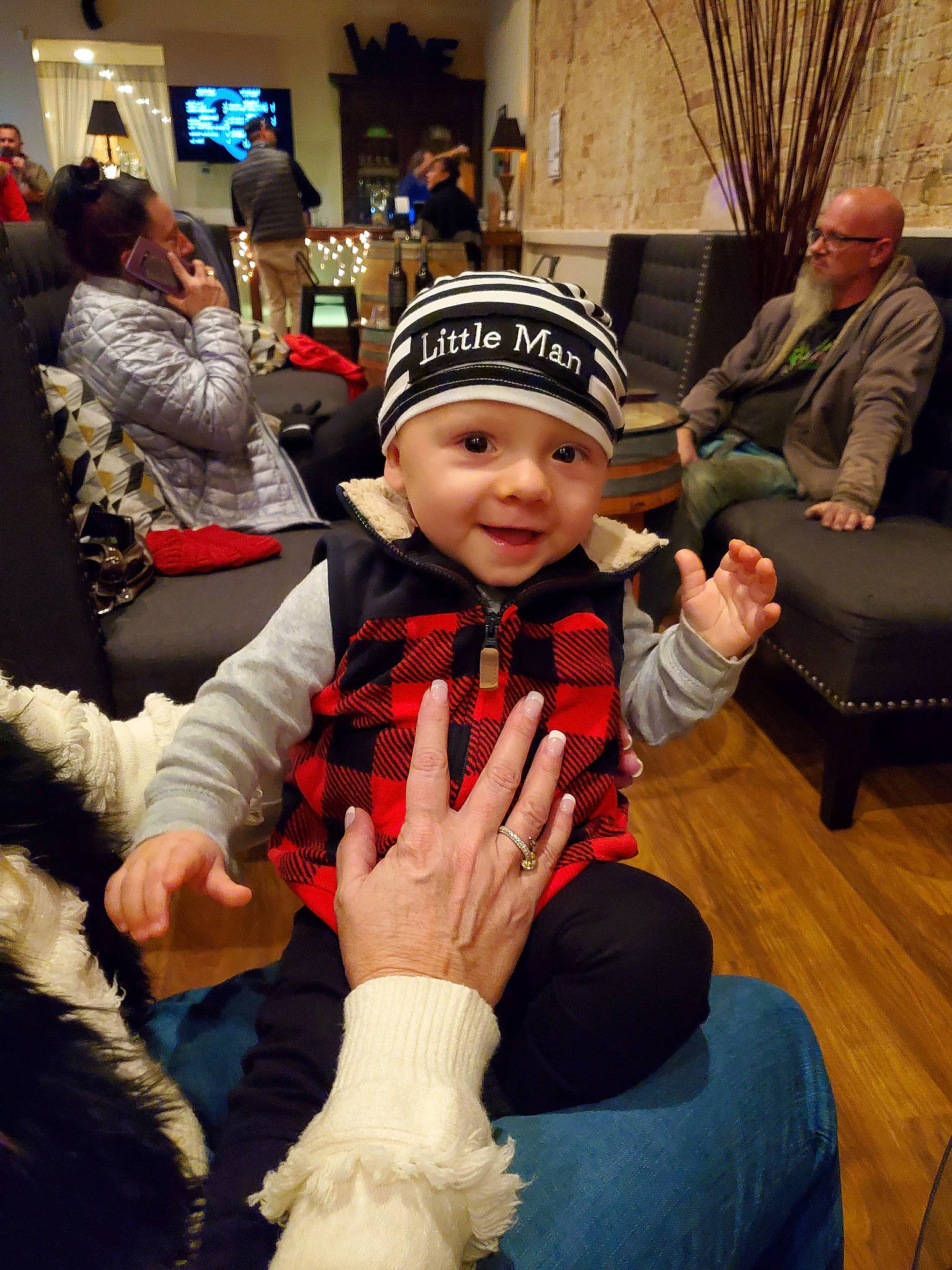 Xander joined the competition — help win amazing prizes! cap, clothing, event, face, fun, happy, head, headgear, headwear, houseplant, interaction, jacket, jeans, lap, leisure, mammal, outerwear, people, person, plant