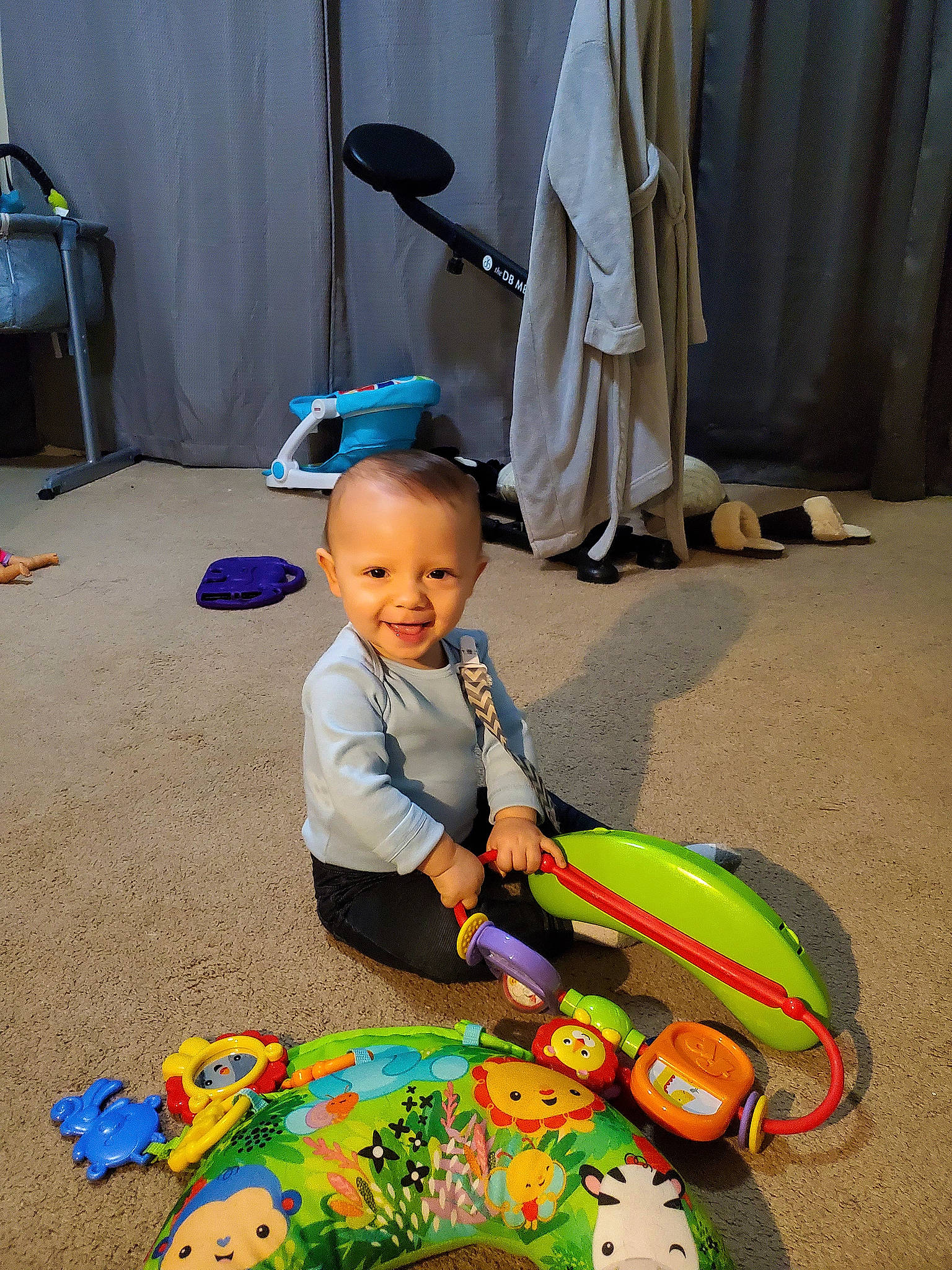 Xander joined the competition — help win amazing prizes! baby, baby_products, baby_toys, child, flooring, fun, joy, leisure, person, plastic, play, recreation, sitting, smile, tire, toddler, toy, toy_vehicle, vehicle, wheel
