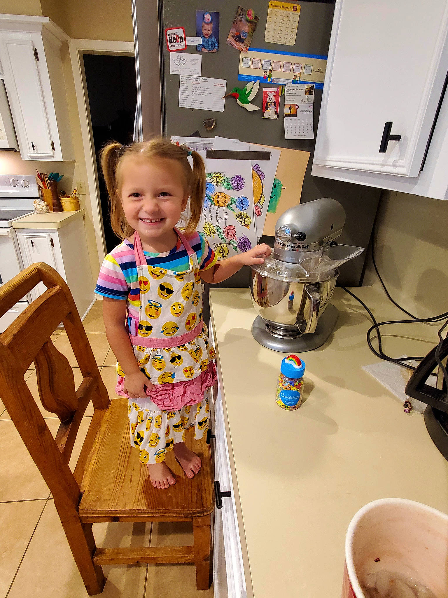 Kadence joined the competition — help win amazing prizes! baby_toddler_clothing, cabinetry, chair, child, cooking, countertop, drawer, fun, home_appliance, homemaker, joy, kitchen, kitchen_appliance, person, picture_frame, plumbing_fixture, room, sink, smile, t_shirt