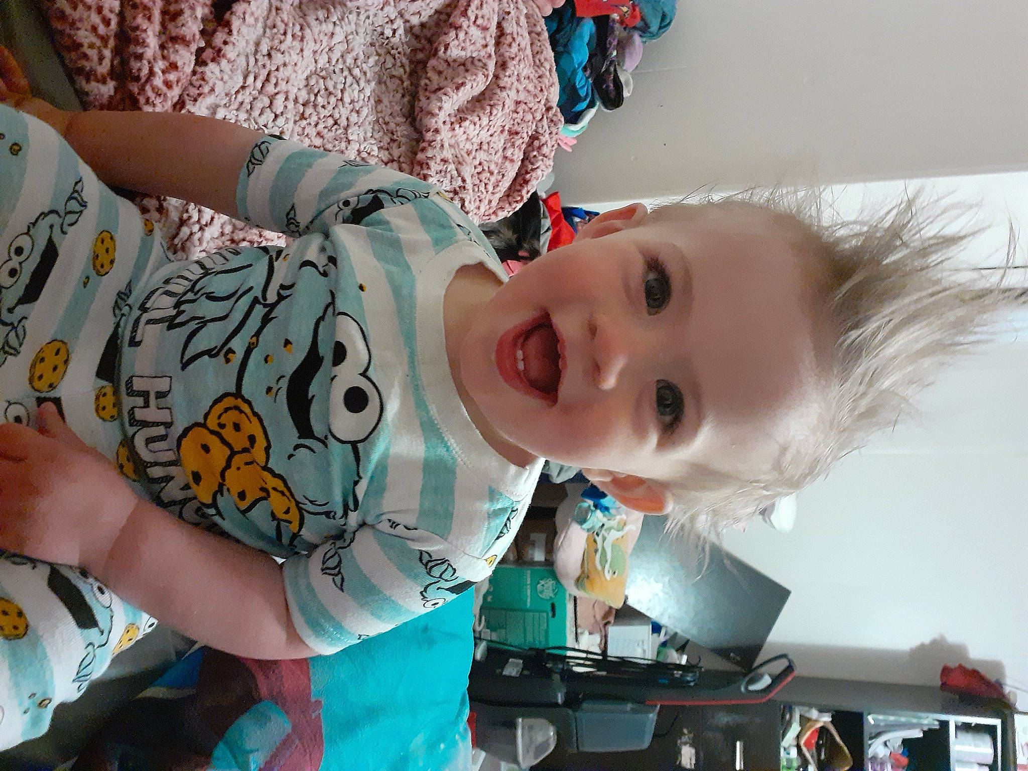 Deklyn joined the competition — help win amazing prizes! baby, baby_products, baby_toddler_clothing, blue, cheek, child, computer_keyboard, fun, happy, home_appliance, iris, mouth, pattern, person, product, room, sitting, sleeve, smile, t_shirt