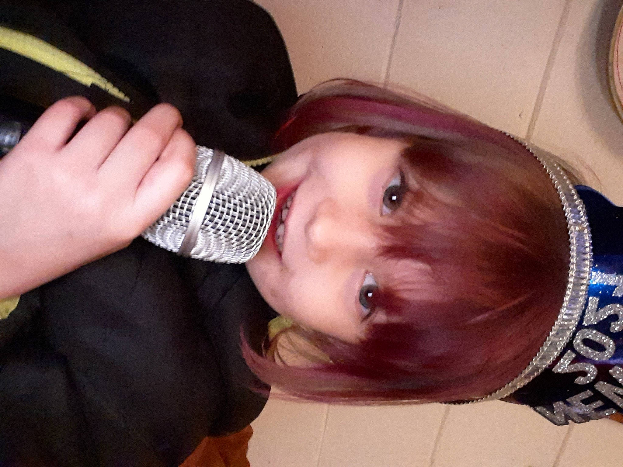 Aleecya joined the competition — help win amazing prizes! audio_equipment, black_hair, child, chin, ear, eye, eyebrow, eyelash, face, finger, fun, lip, microphone, mouth, neck, nose, person, skin, smile, thumb