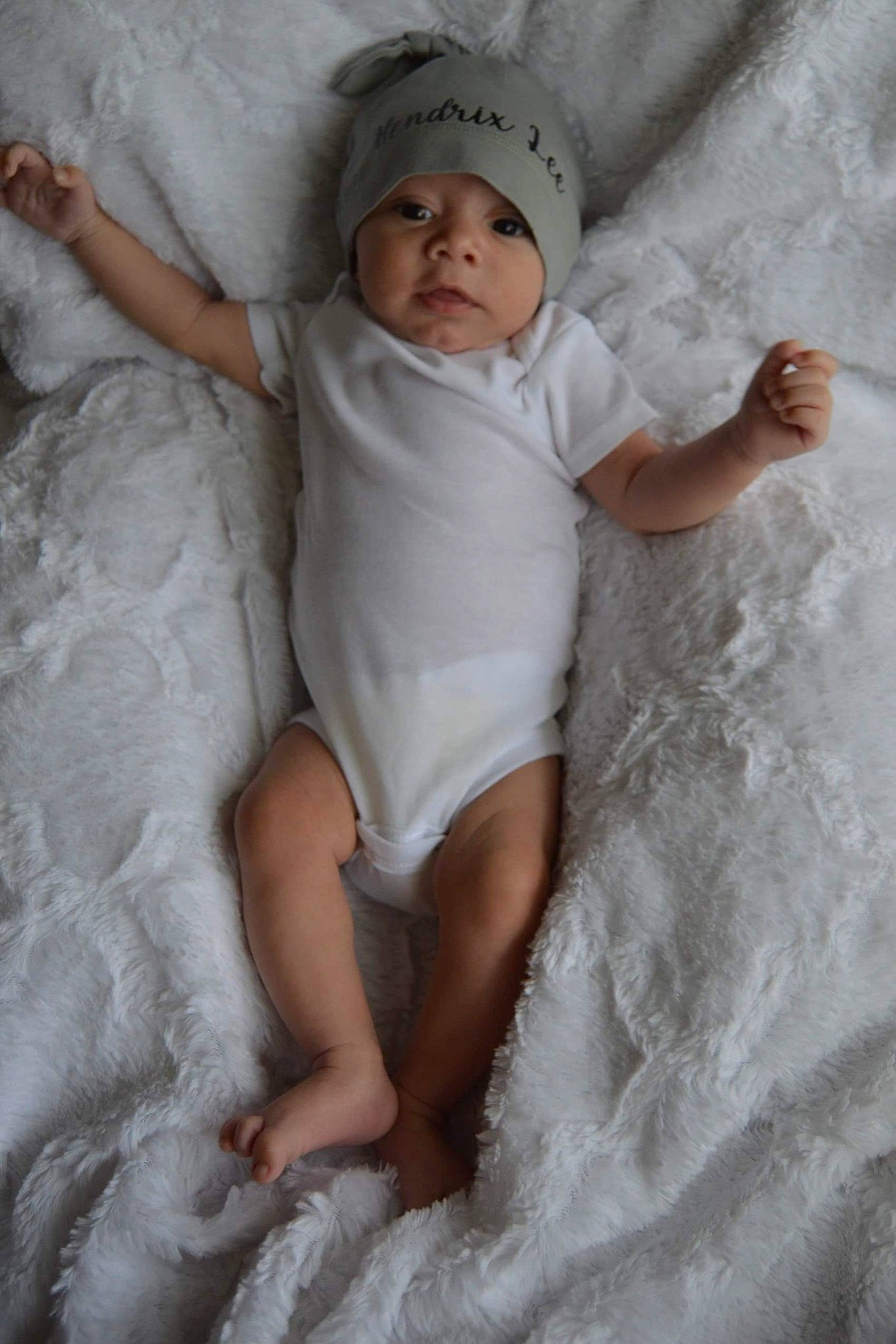 Hendrix Lee joined the competition — help win amazing prizes! baby, baby_sleeping, baby_toddler_clothing, bedding, child, comfort, flesh, foot, fun, fur, hat, headwear, human_leg, linens, person, room, skin, sleeve, thumb, toddler