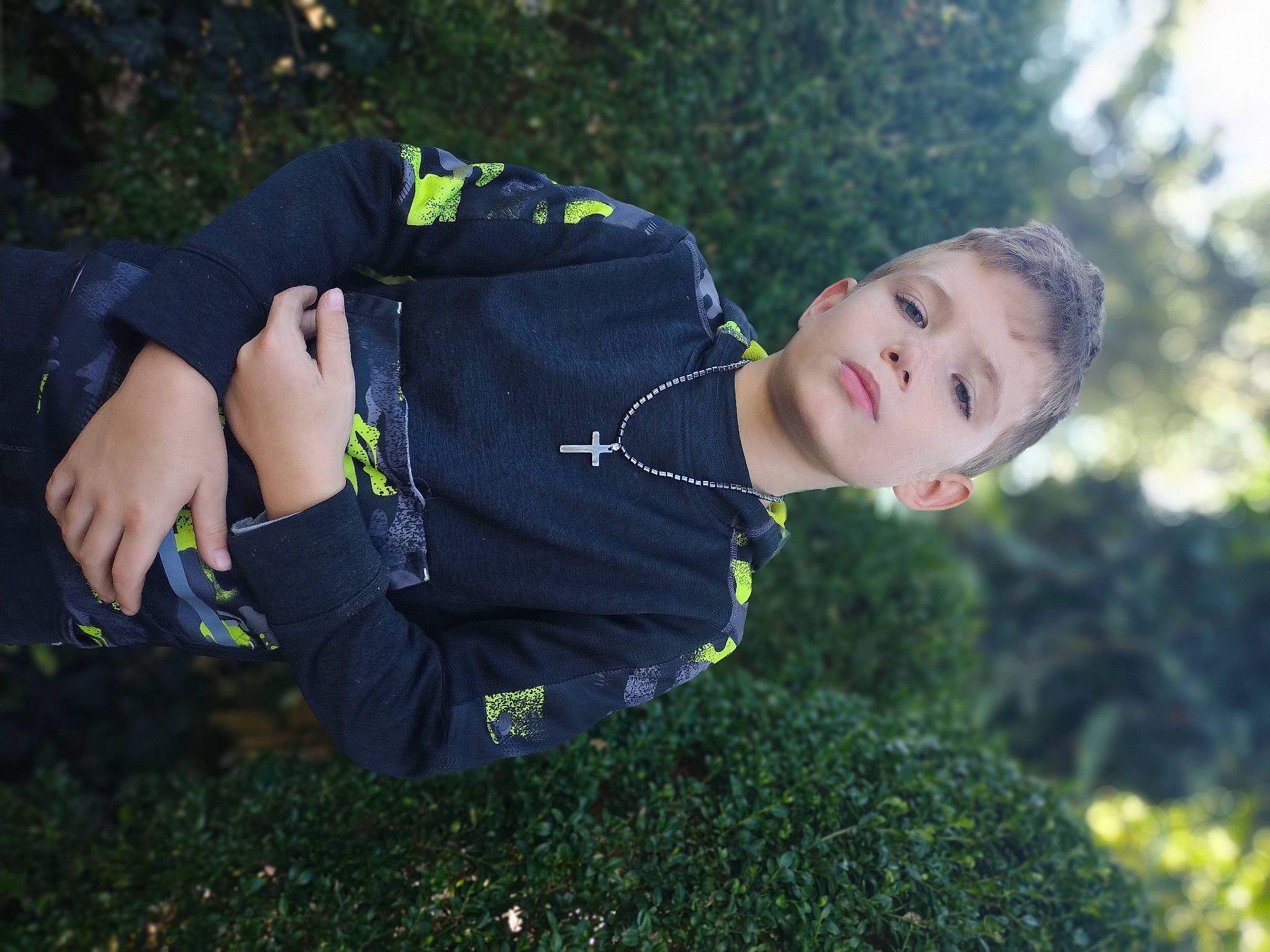 Cyrus is registered to the contest to win money with this photo: child, electric_blue, flash_photography, fun, garden, grass, grassland, happy, lawn, leaf, leisure, people_in_nature, person, plant, portrait_photography, recreation, sitting, sky, spring, toddler