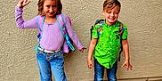Mathias joined the competition — help win amazing prizes! backpack, boy, casual_clothing, child, colorful, friends, girl, gravel, happy, jeans, long_hair, outdoor, peace_sign, playful, posing, sandals, short_hair, smile, sneakers, wall