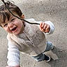Jules a rejoint le concours — aidez-le/la à gagner de superbes lots ! child, toddler, smiling, holding_hand, stick, outdoor, pavement, grass, happy, casual_clothing, vest, sweater, shoes, person, daylight, playful, cute, joy, walking, nature