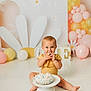 Peyton is registered to the contest to win money with this photo: baby, birthdaycake, birthdayparty, bodypart, cake, cream, cupcake, dessert, eating, face, food, fun, head, icecream, icing, party, people, person, sitting, sweets
