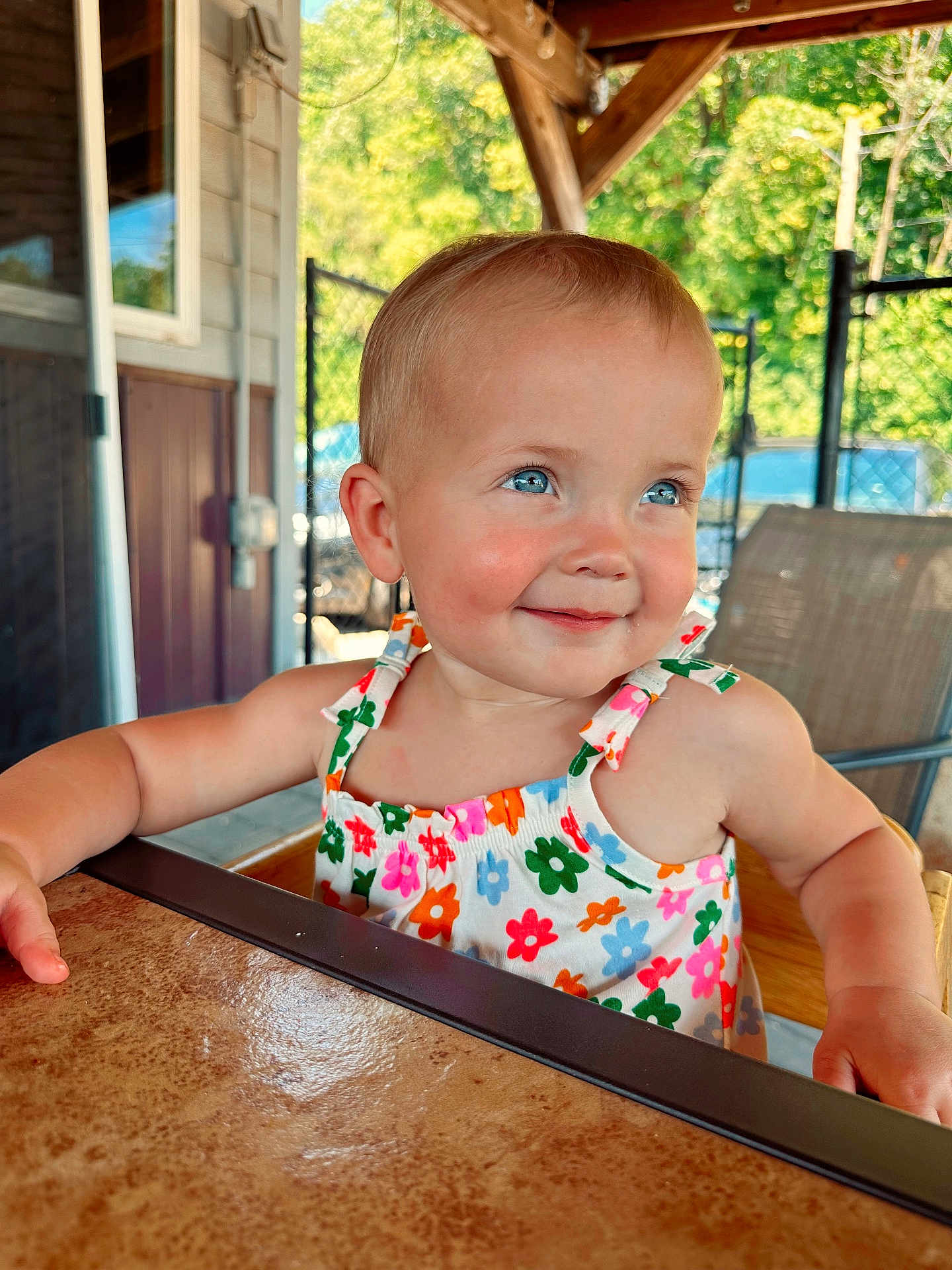 Peyton joined the competition — help win amazing prizes! architecture, baby, bodypart, building, face, finger, furniture, happy, head, house, housing, outdoors, person, photography, porch, portrait, smile, summer, table, wood