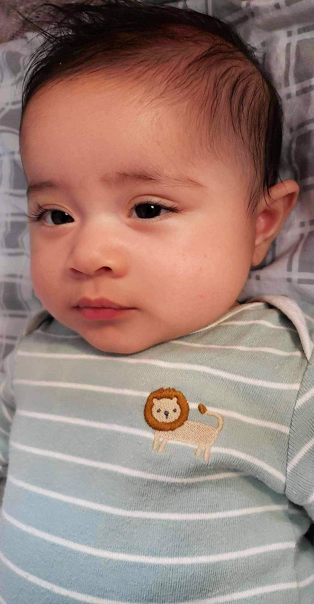 Gregory is registered to the contest to win money with this photo: baby, baby_toddler_clothing, beauty, cheek, child, chin, collar, ear, eyebrow, eyelash, forehead, happy, iris, linens, lip, no_expression, nose, person, skin, sleeve