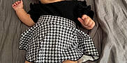 Emilia joined the competition — help win amazing prizes! baby, bed, black_and_white, blanket, bow, clothing, cute, fabric, headband, indoors, infant, legs, peaceful, person, skirt, sleeping, smile, socks, soft, toddler