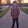 Kyo G participe au concours pour gagner de l'argent avec cette photo : boy, child, city, clothing, coat, face, grass, head, jacket, jeans, male, pants, path, person, photography, plant, portrait, sidewalk, standing, walking