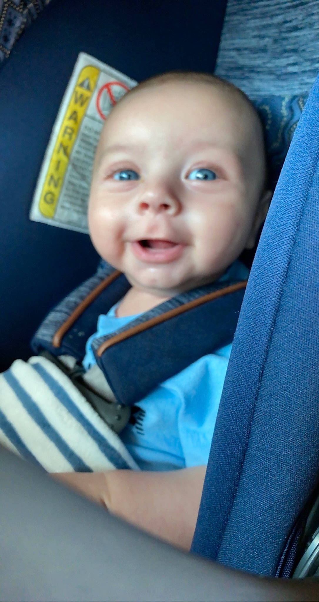 Bennett is registered to the contest to win money with this photo: baby, baby_carriage, baby_in_car_seat, baby_products, baby_safety, baby_toddler_clothing, car_seat, cheek, child, electric_blue, fun, happy, iris, nose, person, product, seat_belt, sitting, skin, smile