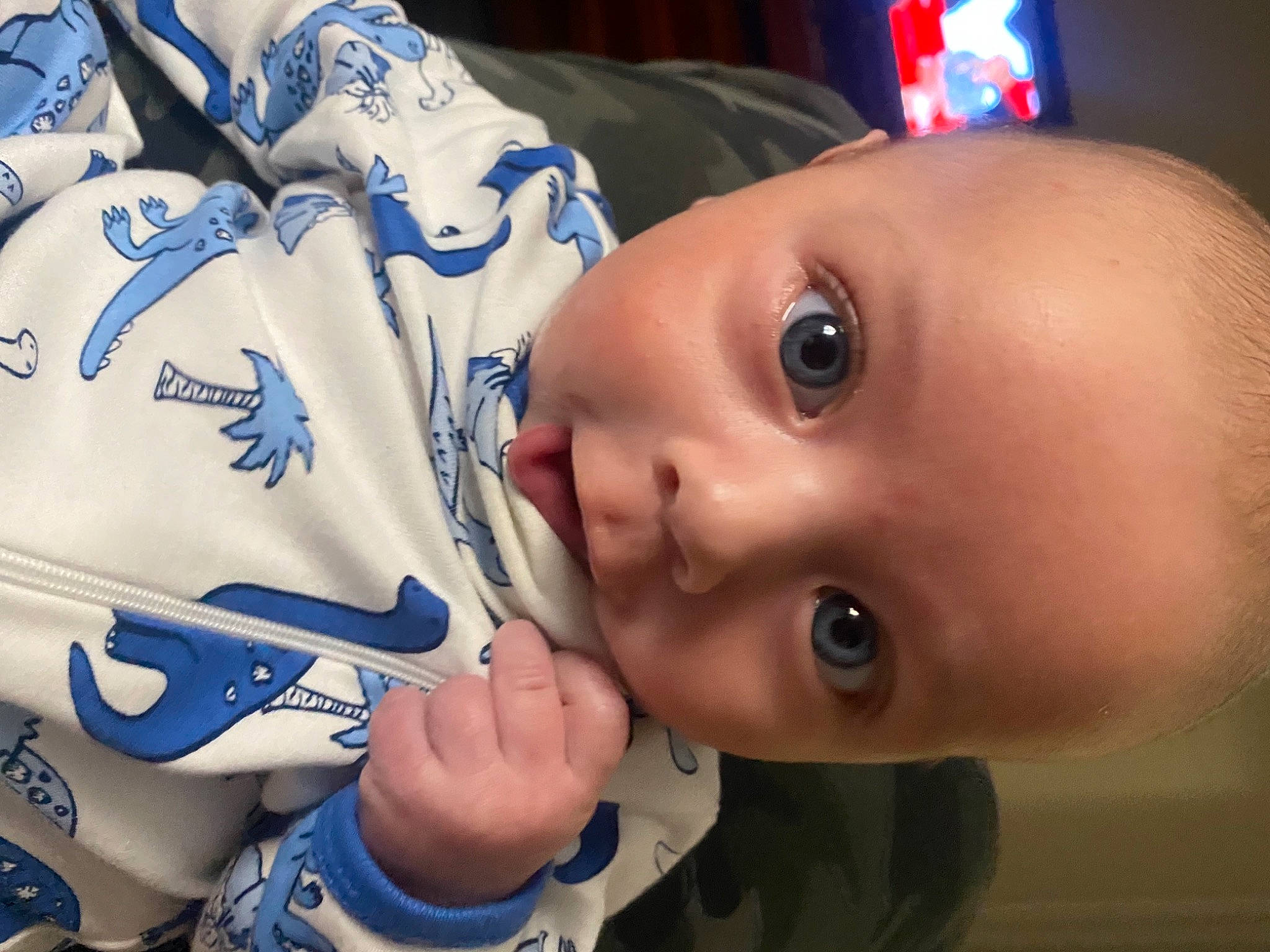 Bennett is registered to the contest to win money with this photo: baby, blue, cheek, chin, cool, eyelash, finger, forehead, gesture, happy, headgear, iris, lip, mammal, mouth, nose, person, smile, sports_gear, toddler