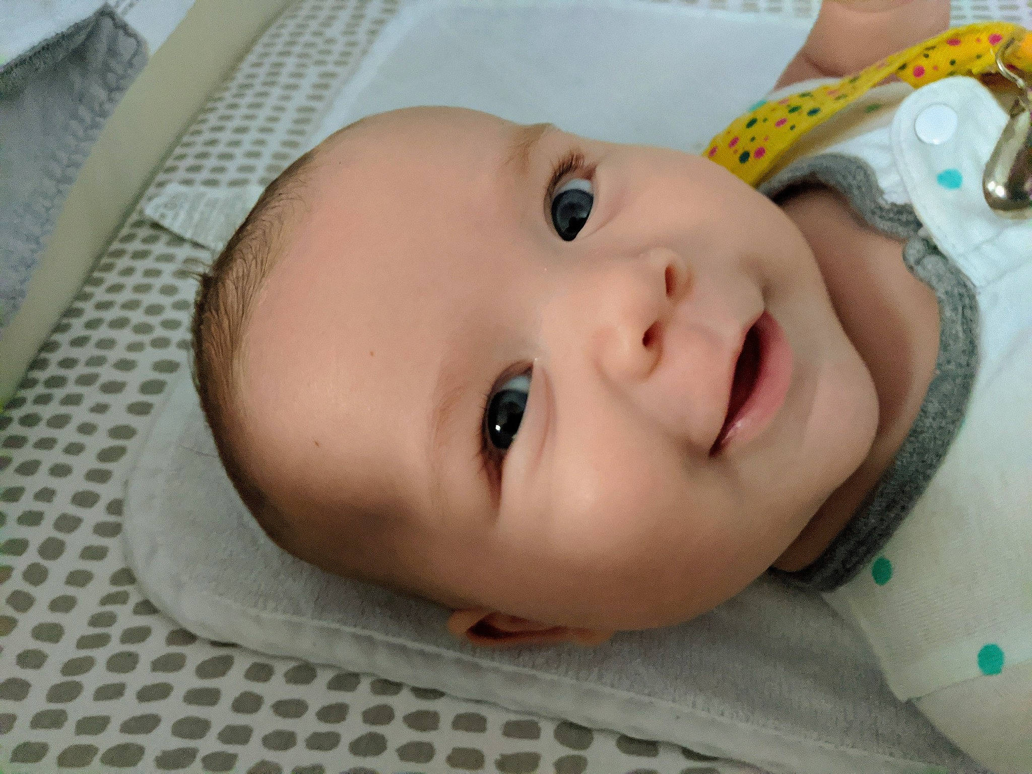 Quentin is registered to the contest to win money with this photo: baby, cheek, child, chin, close_up, eye, eyebrow, face, forehead, head, iris, lip, mouth, nose, person, skin, smile, toddler
