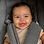 Cataleya joined the competition — help win amazing prizes! baby, smiling, face, child, car_seat, straps, clothing, curly_hair, happy, infant, cute, young_child, portrait, skin, seat, child_seat, safety, indoors, person, closeup