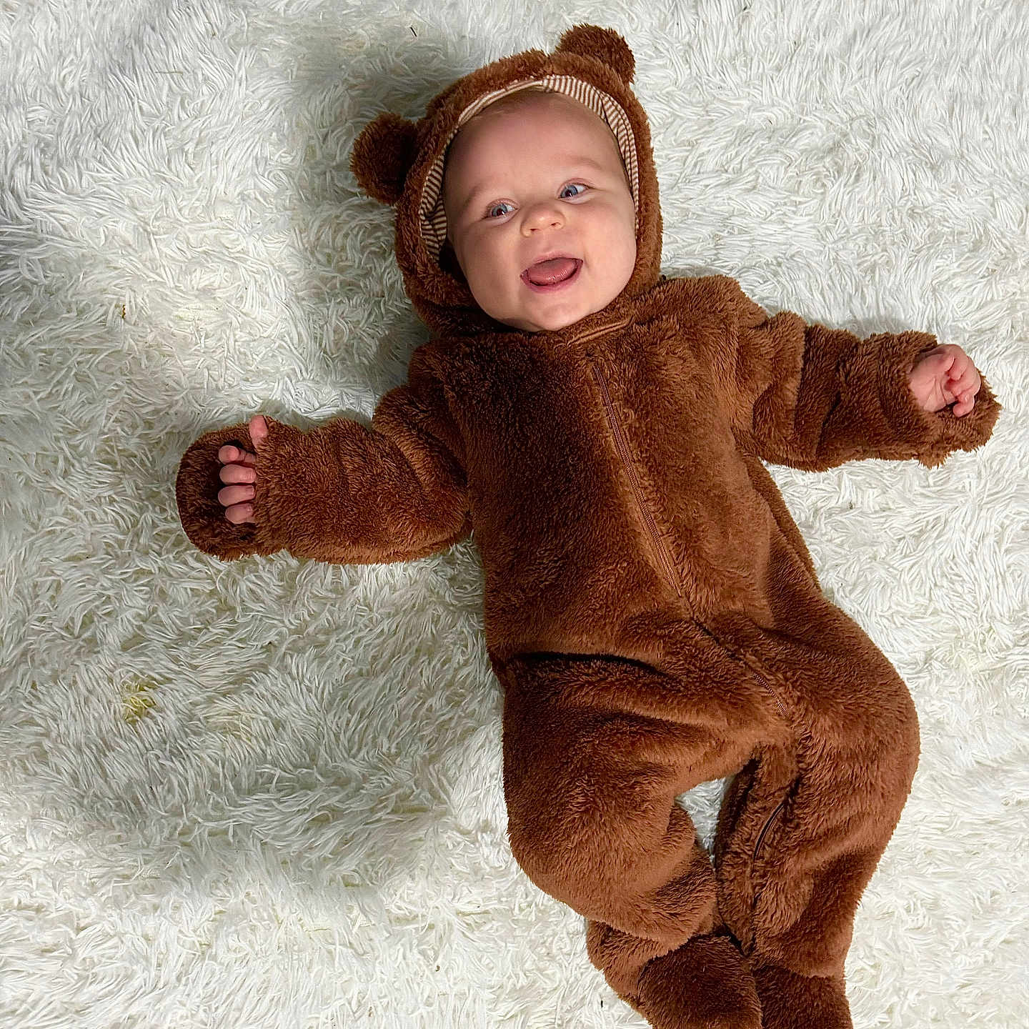 Colton joined the competition — help win amazing prizes! baby, babylaughing, bodypart, bonnet, clothing, coat, face, finger, hand, happy, hat, head, hood, jacket, knitwear, pants, person, photography, portrait, smile