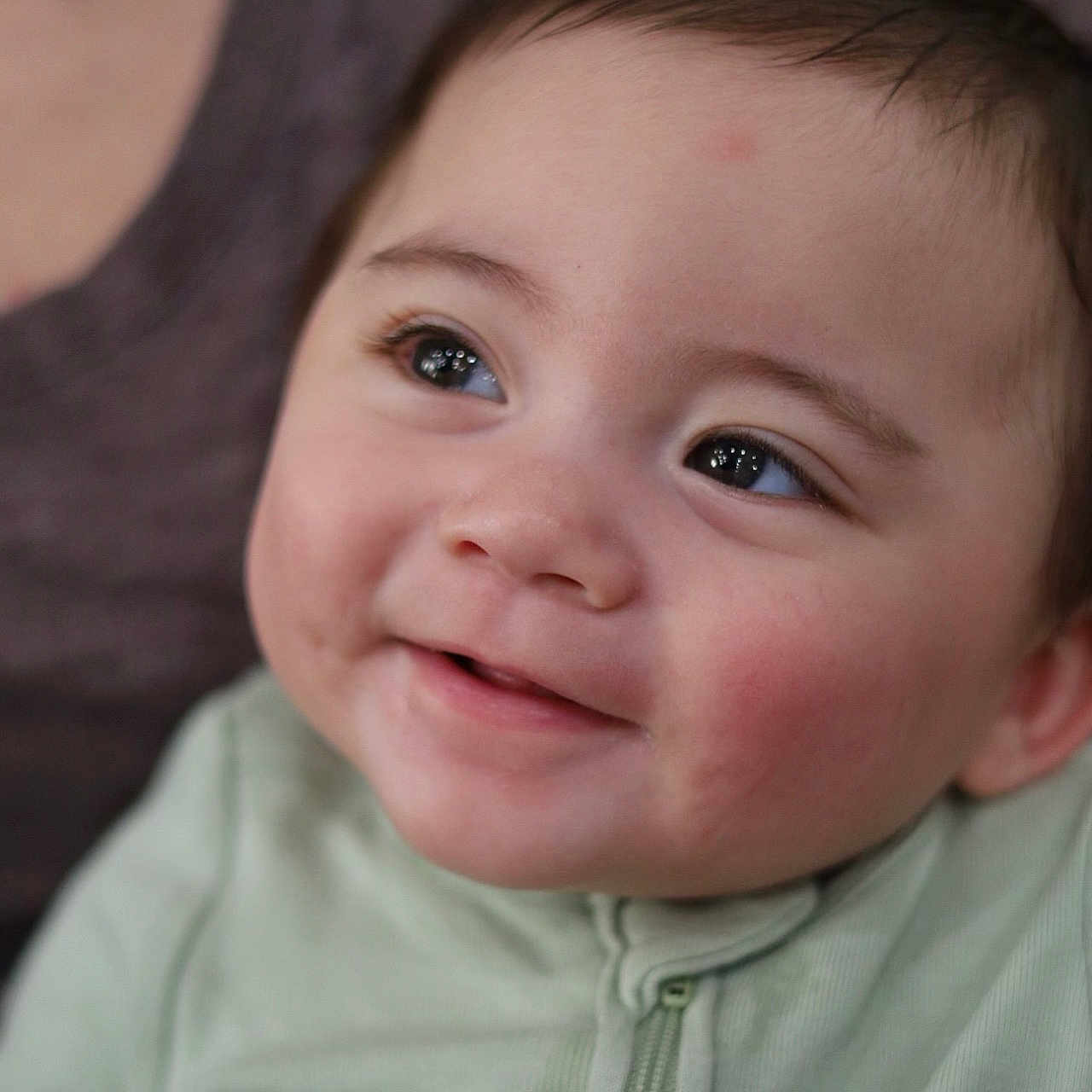 Amós joined the competition — help win amazing prizes! apparel, baby, cheeks, child, closeup, clothing, cute, expression, eyes, face, green, happy, head, human, infant, person, portrait, skin, smile, young