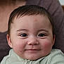 Amós joined the competition — help win amazing prizes! baby, child, smiling, face, portrait, close_up, infant, person, clothing, green_outfit, rosy_cheeks, young_child, cute, happy, indoor, human, head, eyes, hair, skin
