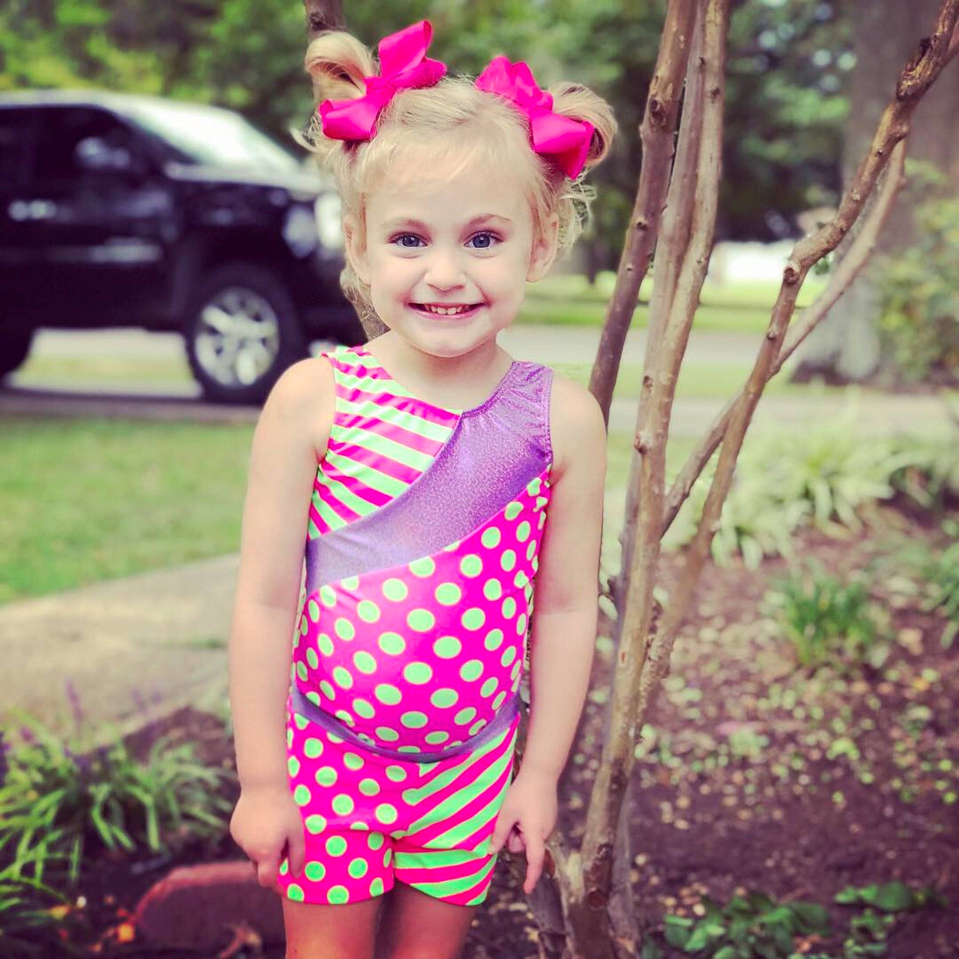 Vivian Potashnick is registered to the contest to win money with this photo: child, clothing, design, girl, hair_accessory, joy, magenta, pattern, person, pink, polka_dot, smile, toddler