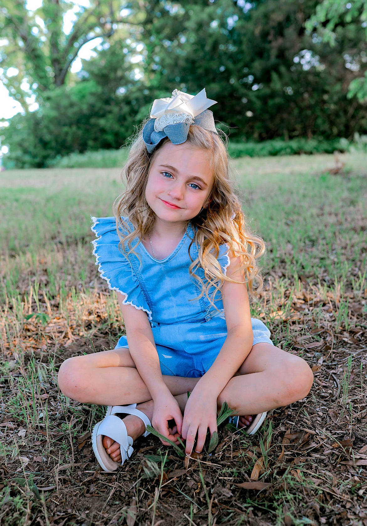 Vivian is registered to the contest to win money with this photo: baby_toddler_clothing, botany, electric_blue, flash_photography, grass, grassland, happy, joy, leaf, leg, light, long_hair, meadow, people_in_nature, person, plant, skin, smile, summer, sunlight