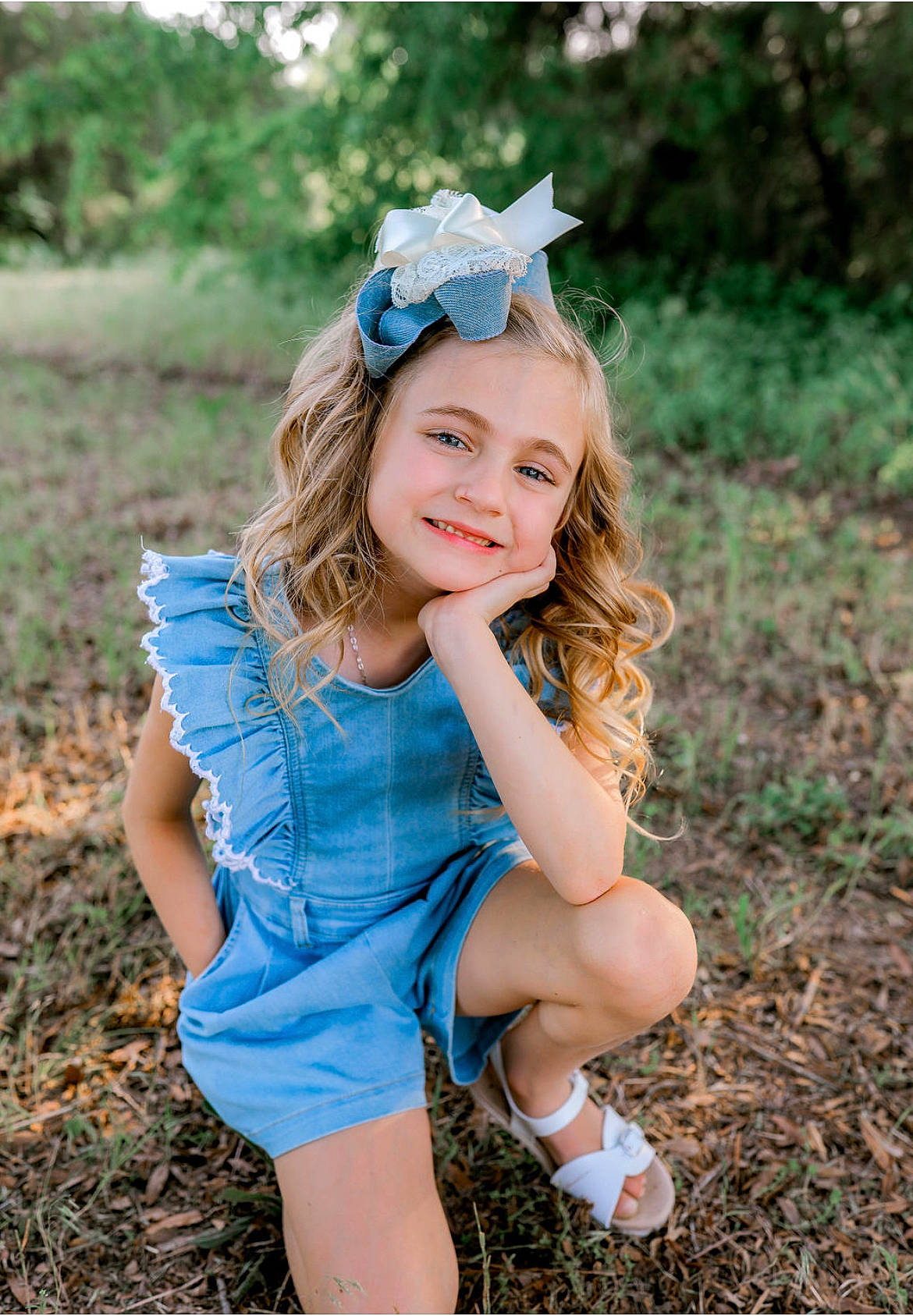 Vivian is registered to the contest to win money with this photo: blond, child, electric_blue, face, flash_photography, fun, grass, grassland, hair, happy, head, iris, joy, long_hair, natural_environment, people_in_nature, person, plant, recreation, skin