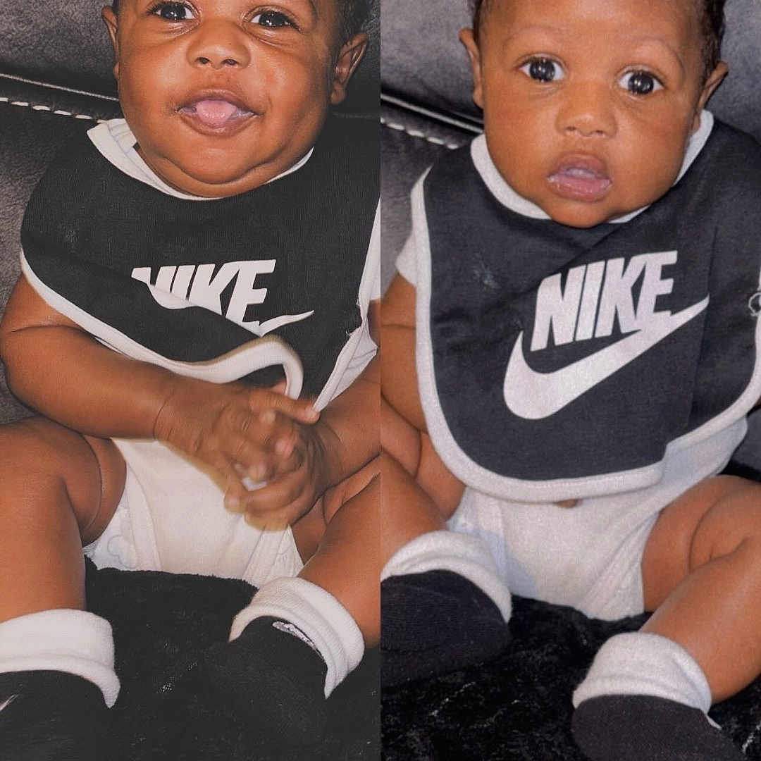 Jkyri joined the competition — help win amazing prizes! baby, infant, child, nike, bib, socks, couch, smile, curious, portrait, seated, indoor, cute, adorable, clothing, black, white, face, hands, young