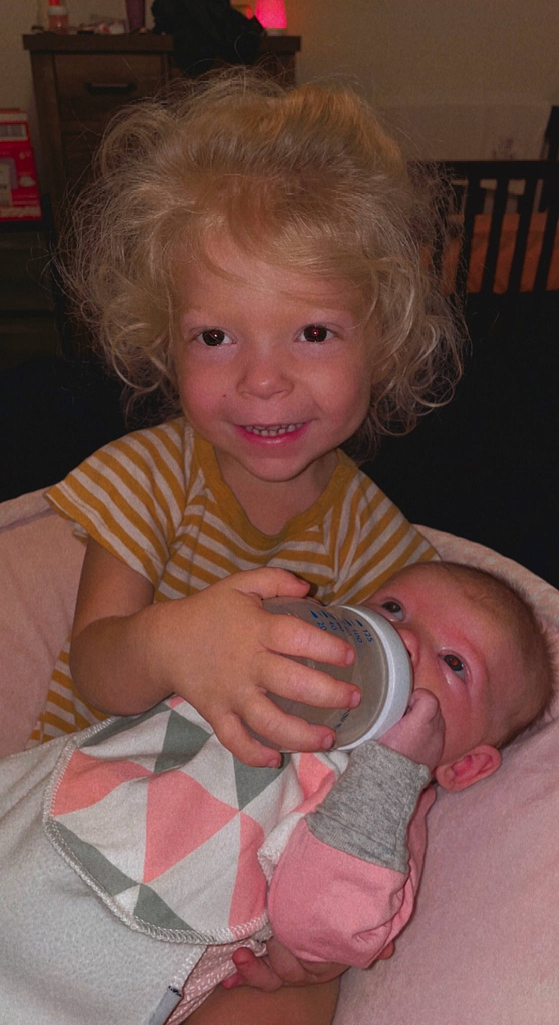 Raelynn is registered to the contest to win money with this photo: arm, baby, baby_toddler_clothing, cheek, child, chin, comfort, finger, fun, gesture, hand, happy, iris, joy, lip, mouth, nose, person, pink, skin