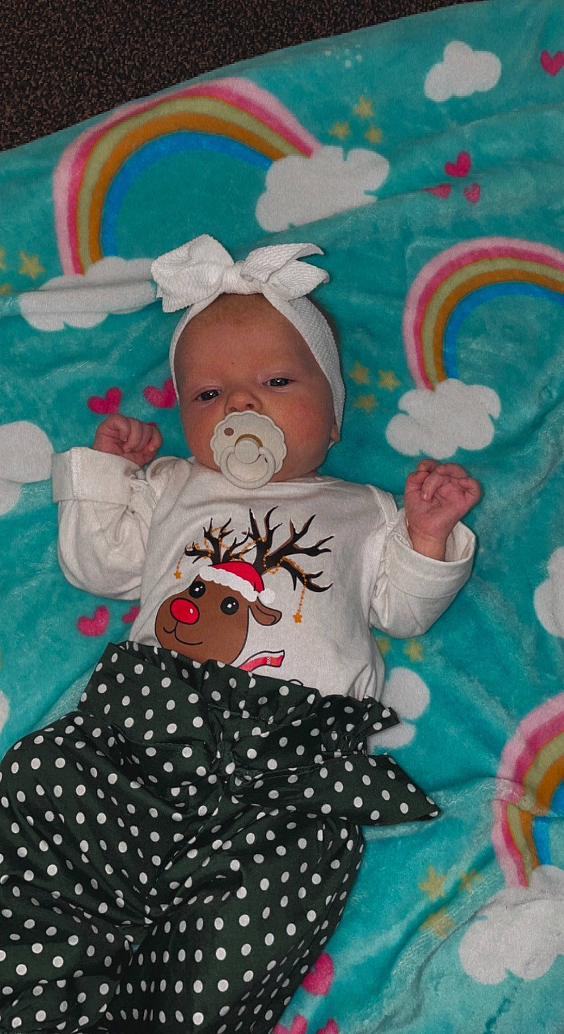 Remi is registered to the contest to win money with this photo: art, baby, baby_toddler_clothing, child, costume_hat, event, fun, happy, illustration, linens, mammal, paint, painting, pattern, person, pink, sleeve, textile, toddler, vertebrate