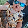 Michael joined the competition — help win amazing prizes! baby, child, sunglasses, tattoo, arm, shirt, cowboy, horse, outdoor, grass, person, holding, smiling, sunlight, reflection, summer, cute, casual, fashion, portrait
