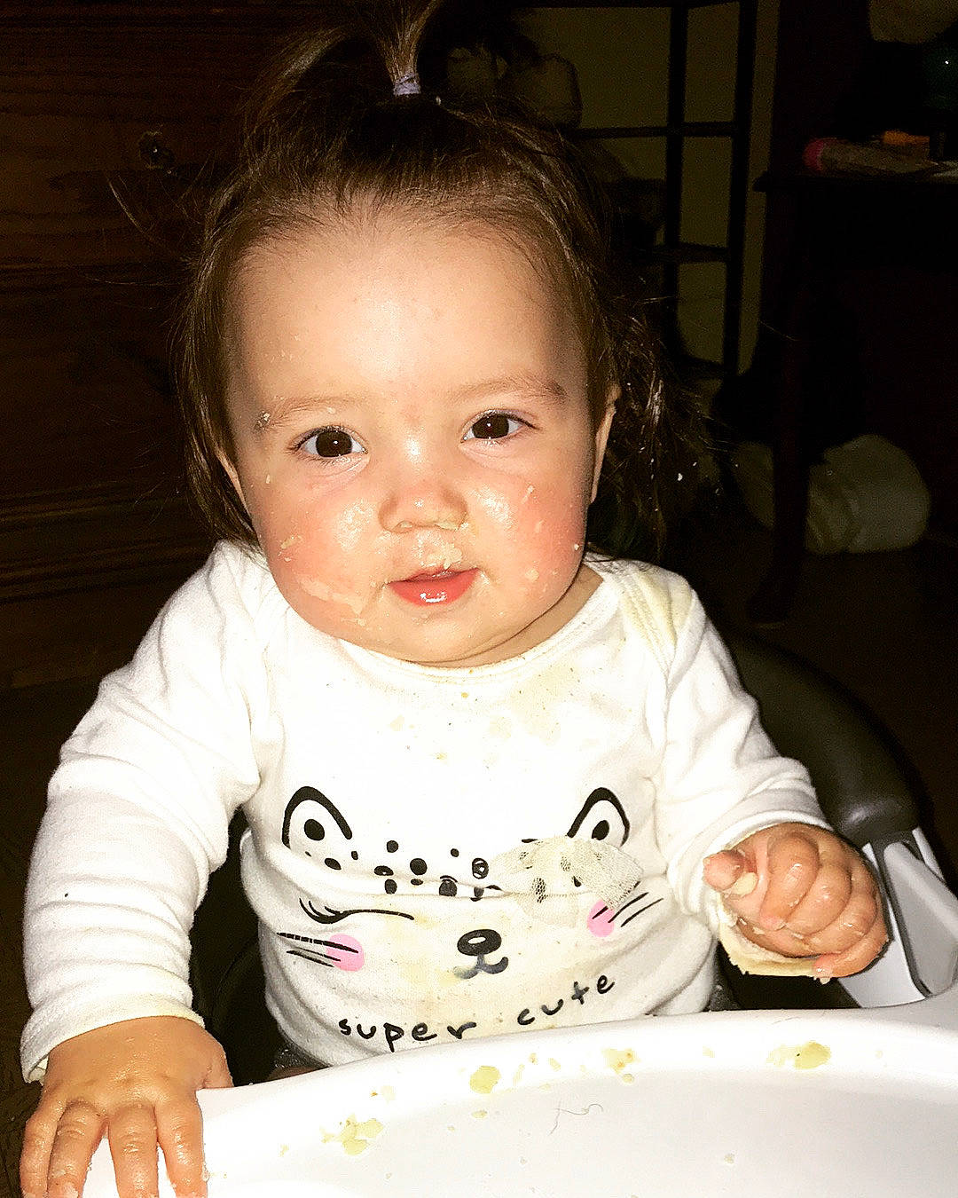 Miah is registered to the contest to win money with this photo: baby, cheek, child, comfort_food, eating, face, food, nose, person, sitting, skin, smile, toddler