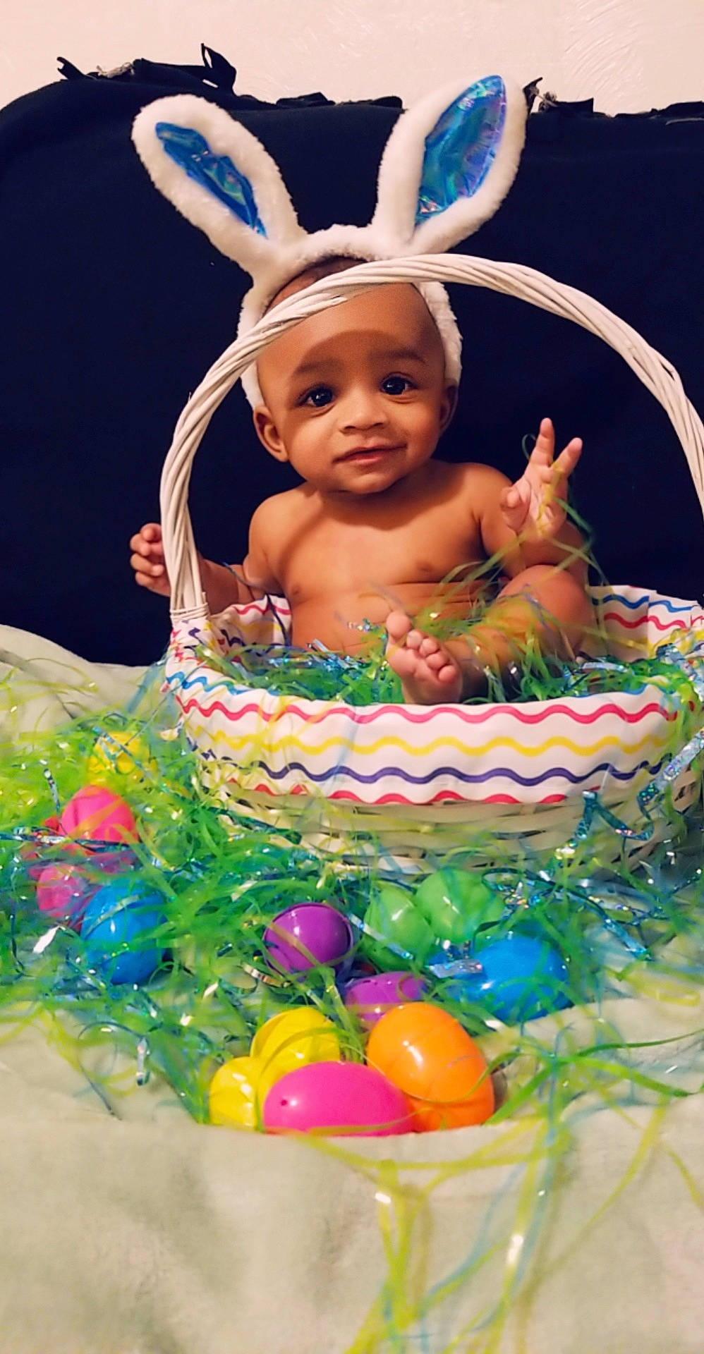 Maurice is registered to the contest to win money with this photo: baby, basket, child, easter, easter_bunny, easter_egg, headwear, holiday, person, toddler