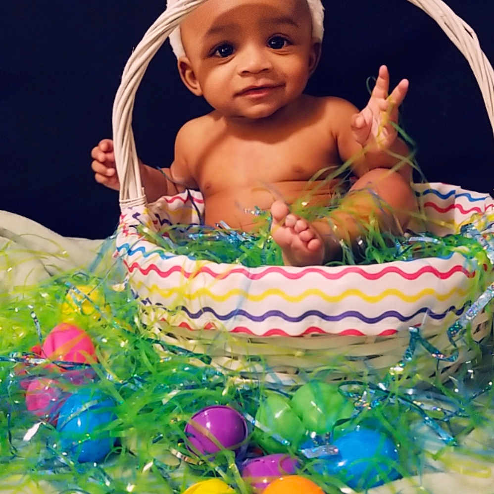 Maurice is registered to the contest to win money with this photo: baby, basket, child, easter, easter_bunny, easter_egg, headwear, holiday, person, toddler