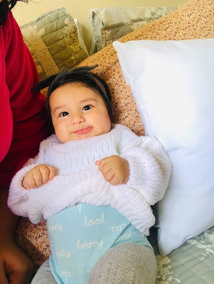 Jayleen is registered to the contest to win money with this photo: baby, baby_products, bedding, cheek, child, person, pink, product, skin, smile, textile, toddler