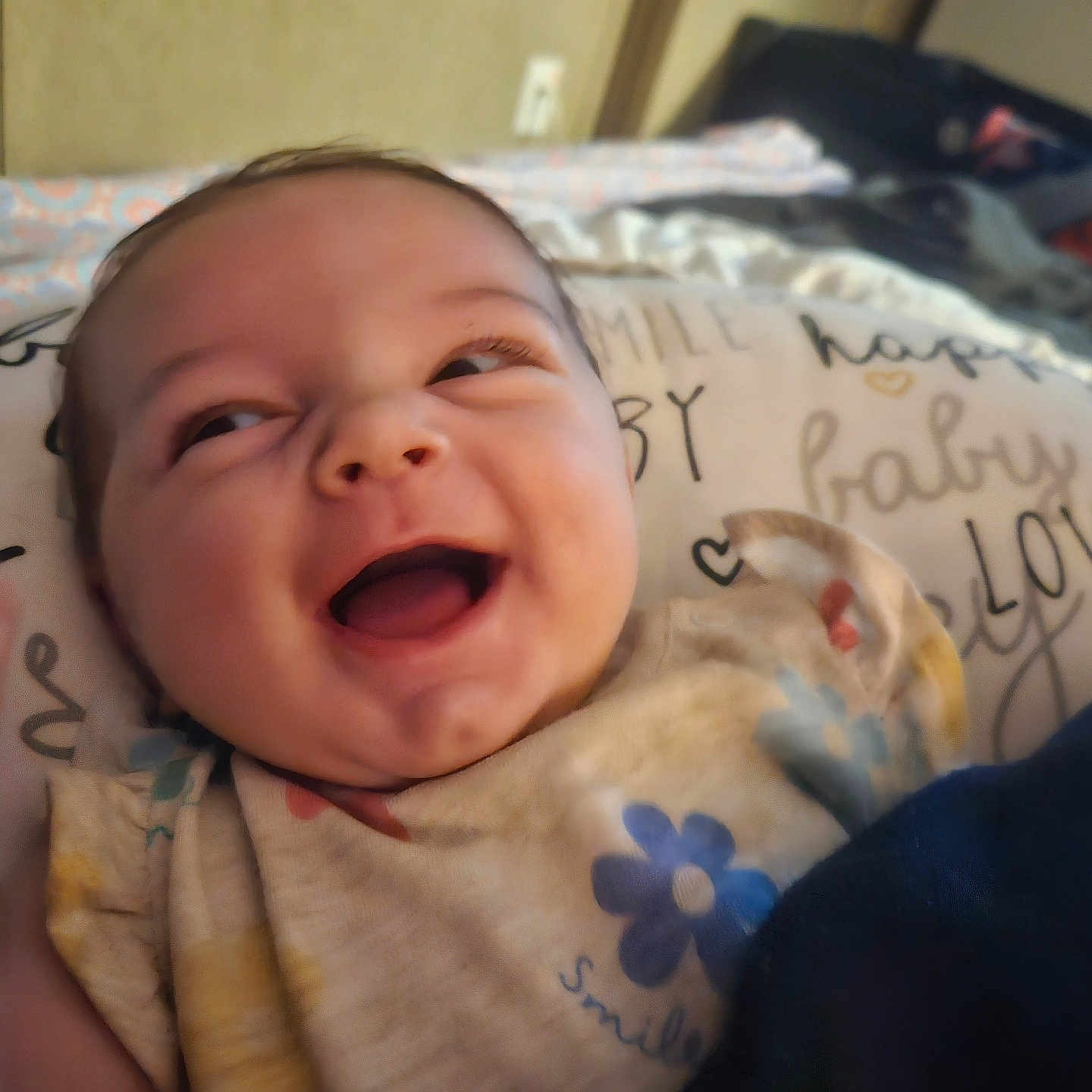 Emberlee joined the competition — help win amazing prizes! baby, blanket, cheerful, child, closeup, clothing, cute, expression, face, happy, indoors, infant, person, pillow, portrait, sleepwear, smiling, soft, toddler, young