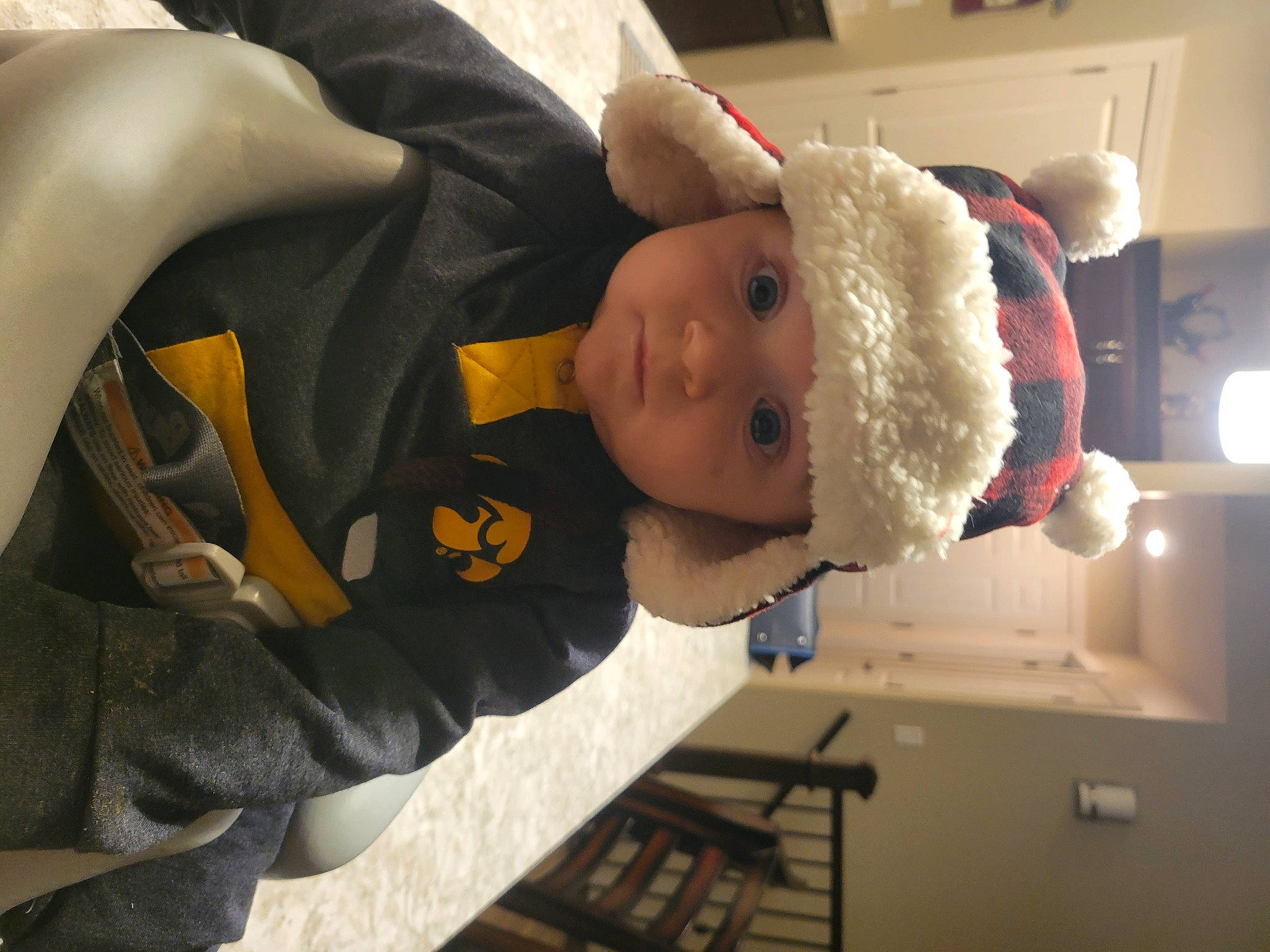 Jax is registered to the contest to win money with this photo: baby, carmine, child, comfort, costume, event, fictional_character, fur, headgear, headwear, person, room, stuffed_toy, toddler