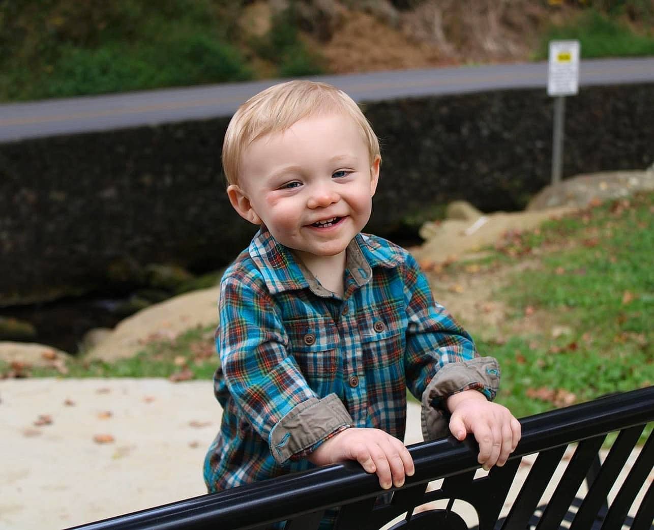 Emmet is registered to the contest to win money with this photo: baby, baby_toddler_clothing, chair, child, city, fun, grass, happy, joy, leisure, pattern, person, plaid, plant, portrait_photography, recreation, sitting, smile, t_shirt, tartan