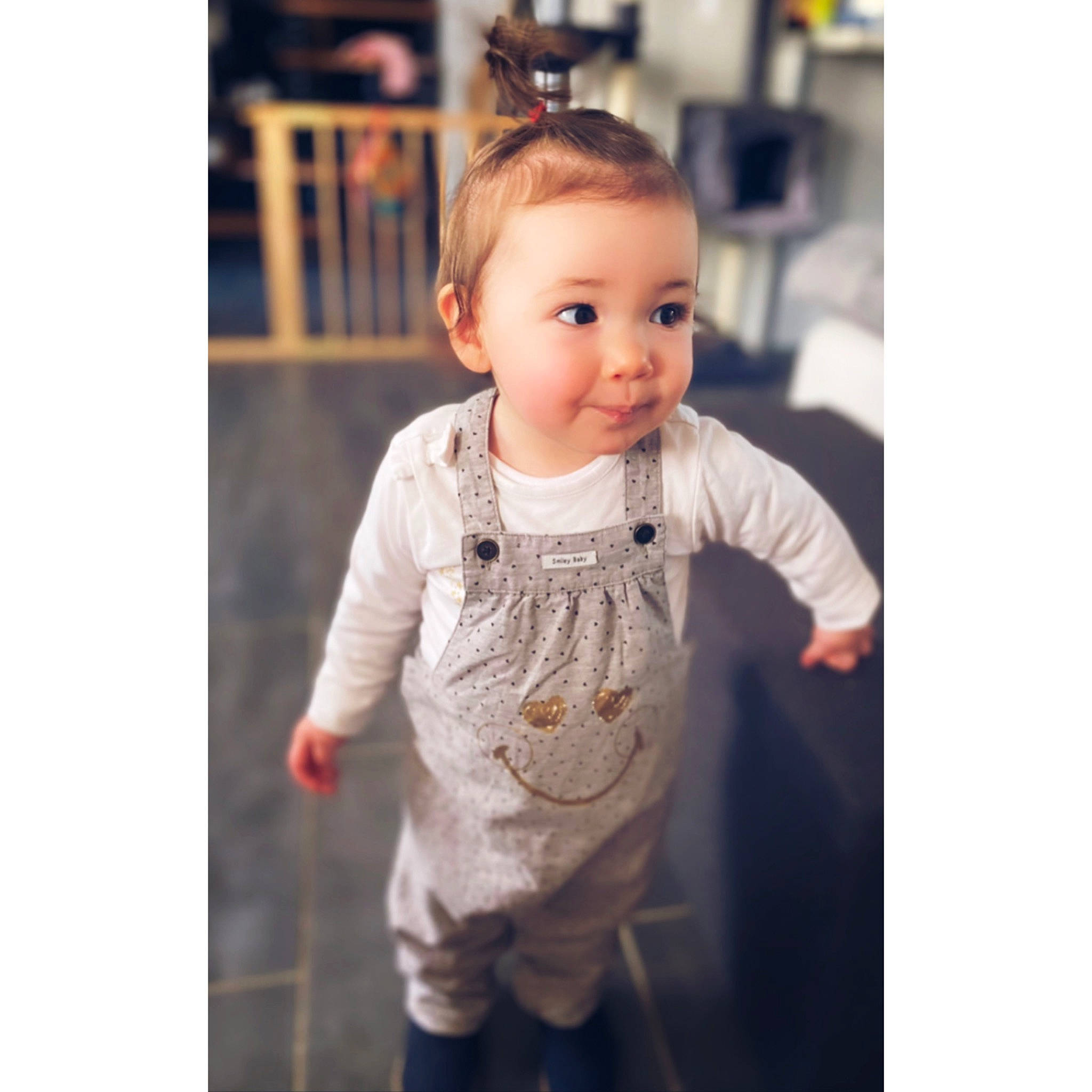 Elya participe au concours pour gagner de l'argent avec cette photo : baby, baby_toddler_clothing, cheek, collar, dress, eye, face, flooring, formal_wear, hair, happy, long_sleeved_t_shirt, pattern, person, sitting, skin, sleeve, smile, street_fashion, t_shirt