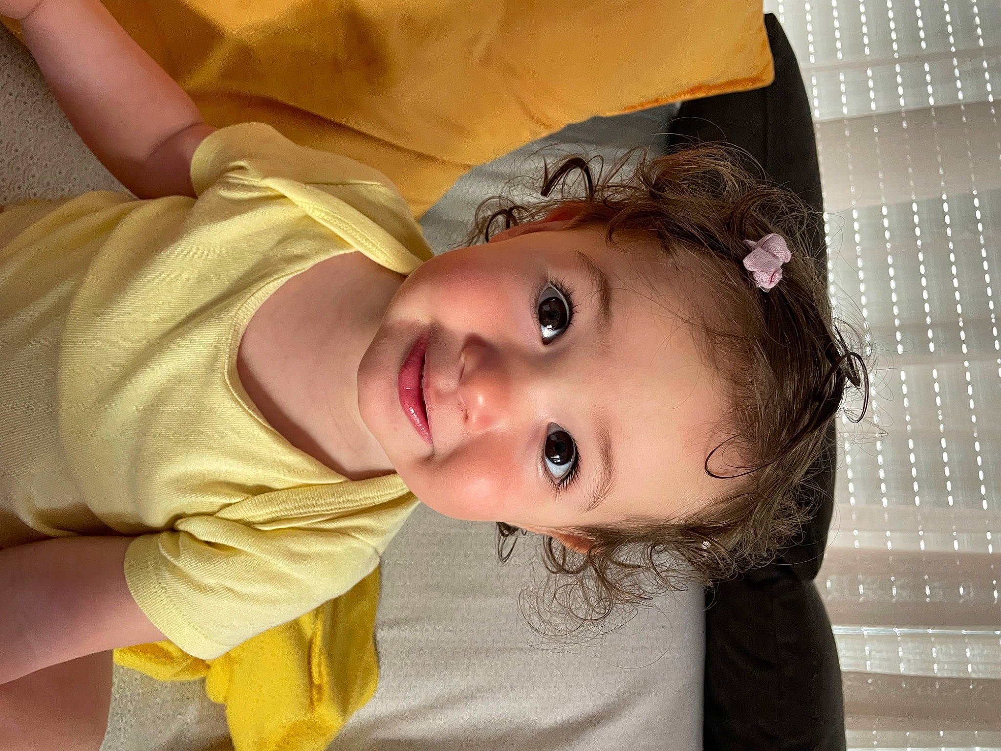 Elya participe au concours pour gagner de l'argent avec cette photo : baby, baby_toddler_clothing, cheek, child, chin, dress, eyebrow, eyelash, hair, happy, iris, lip, mouth, nose, person, pink, skin, sleeve, smile, toddler