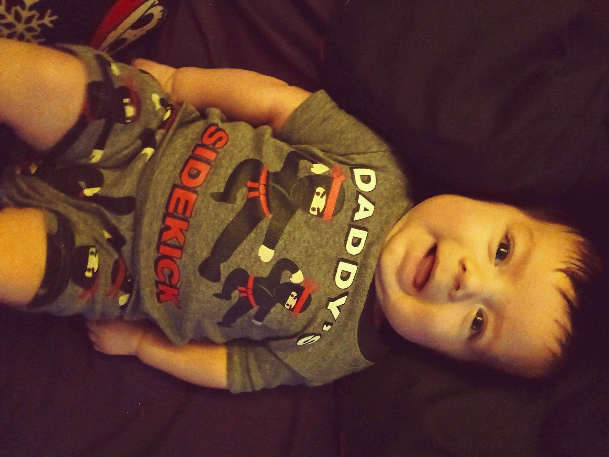 Keanu is registered to the contest to win money with this photo: baby_toddler_clothing, bracelet, elbow, eyelash, fashion_accessory, flash_photography, fun, gesture, headgear, human_body, human_leg, nail, neck, person, personal_protective_equipment, sleeve, thumb, toddler, wood, wrist