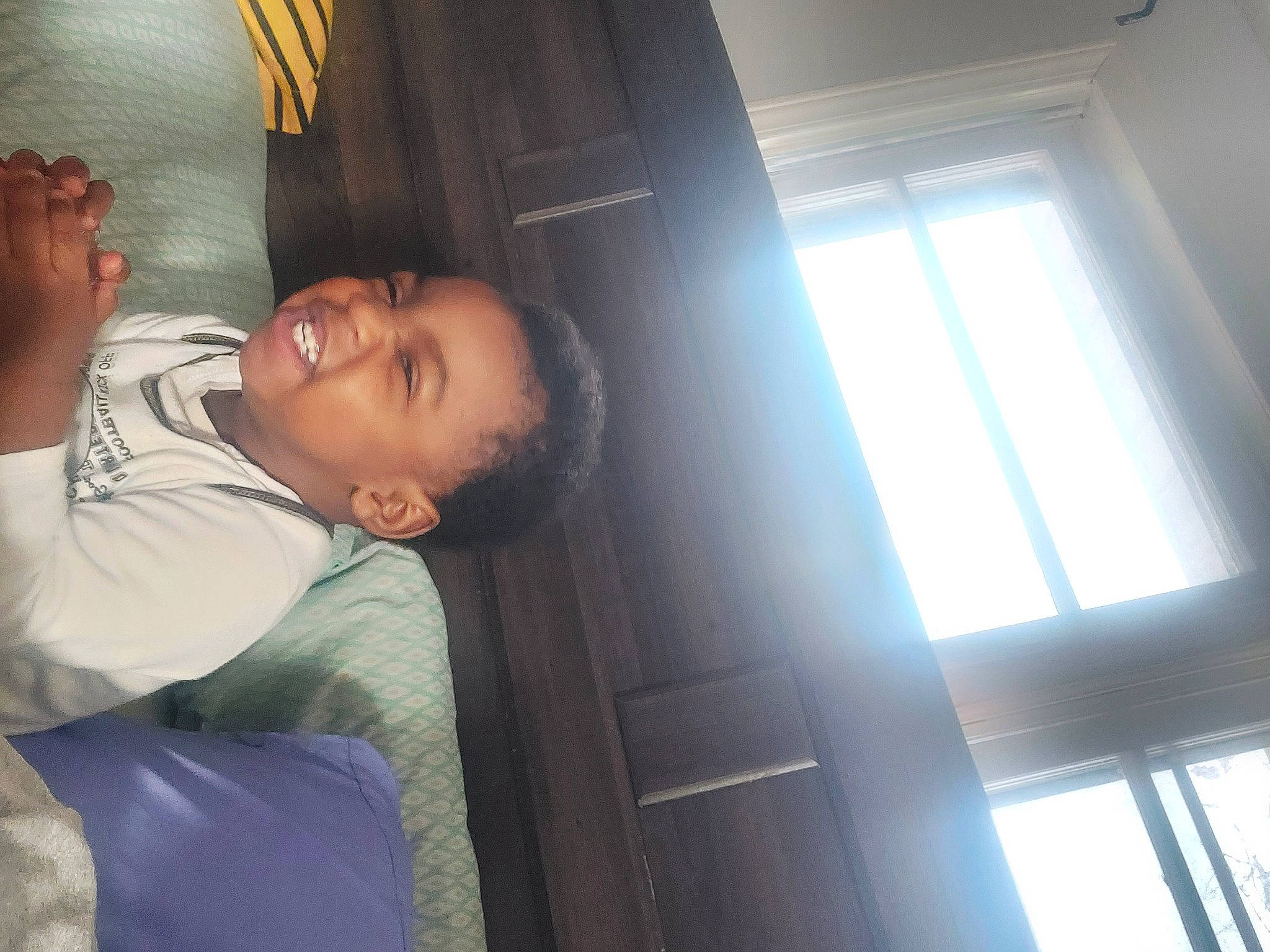 Kingstyn joined the competition — help win amazing prizes! black_hair, ceiling, child, comfort, daylighting, elbow, fun, nap, person, room, shade, sitting, smile, tints_and_shades, toddler, transport, window, wood