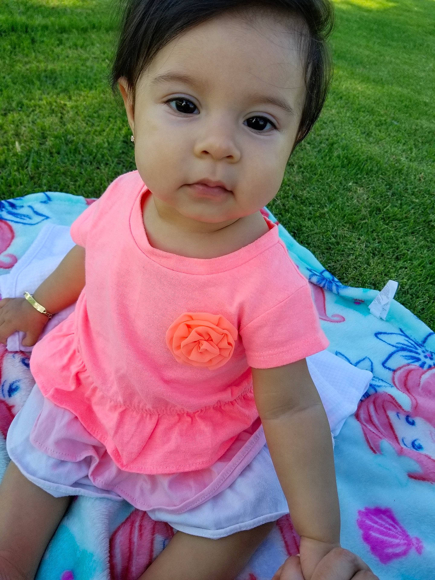 Kiana is registered to the contest to win money with this photo: abdomen, cheek, child, day, face, fun, girl, happiness, head, infant, iris, leg, mouth, person, pink, play, product, skin, smile, summer