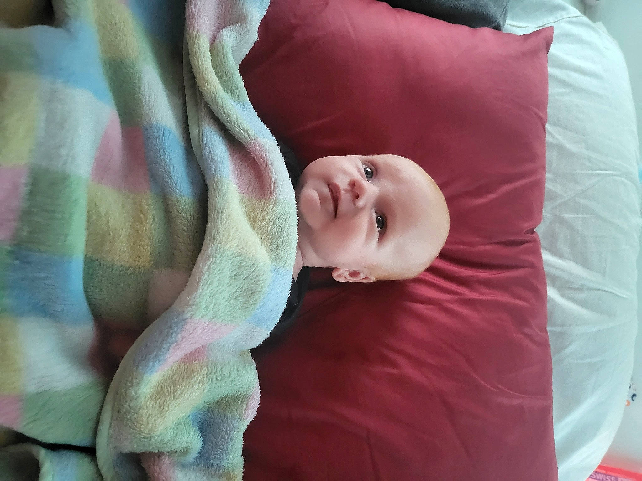 Mathayus is registered to the contest to win money with this photo: baby, baby_products, baby_toddler_clothing, beauty, bedding, bedtime, cheek, comfort, head, human_body, linens, magenta, person, pink, product, purple, sleep, sleeve, smile, textile