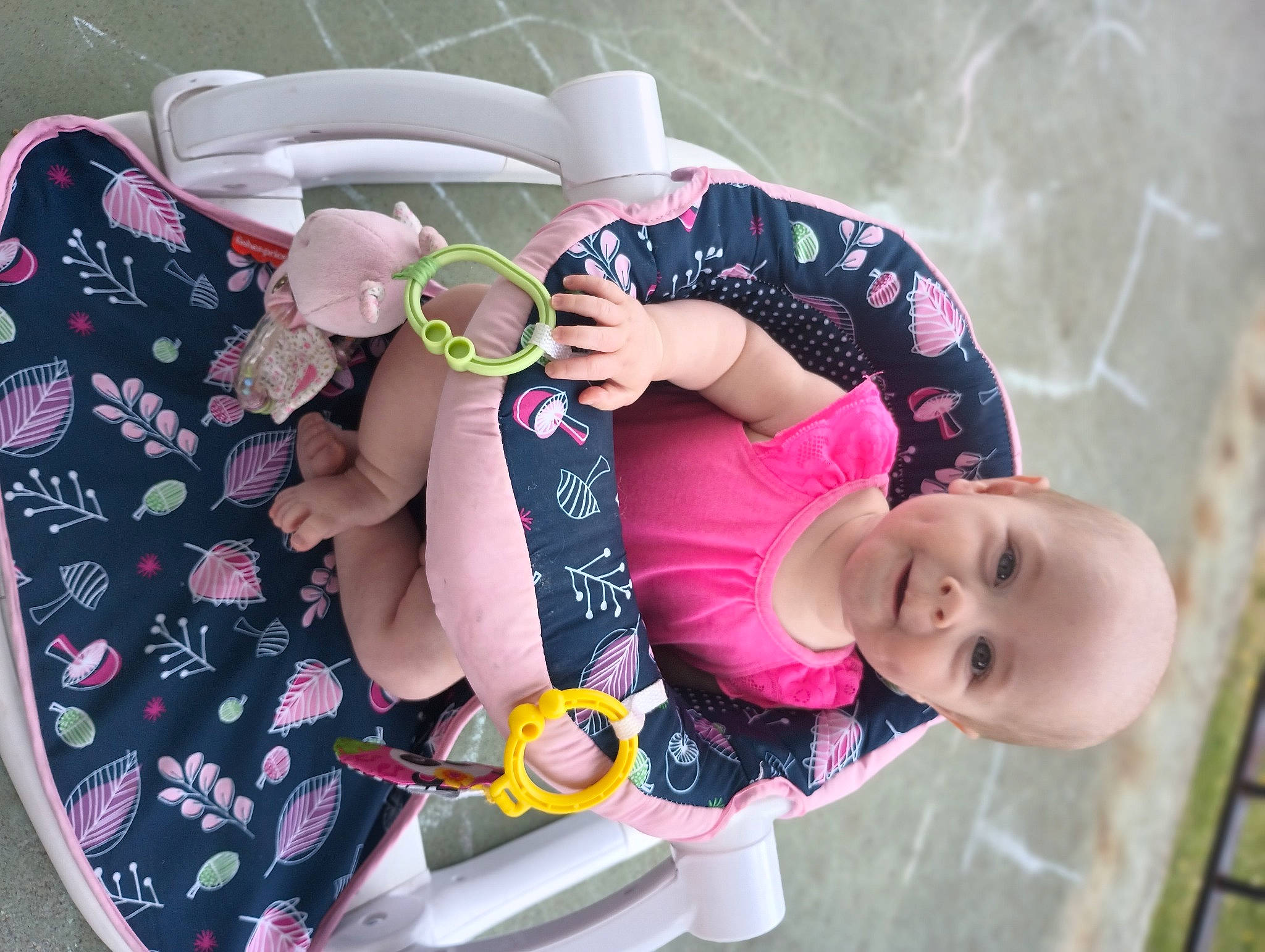Kayleigh joined the competition — help win amazing prizes! baby, baby_products, baby_toddler_clothing, bag, child, comfort, fashion_accessory, grass, hand, happy, linens, pattern, person, personal_protective_equipment, pink, play, product, sitting, sleeve, thigh