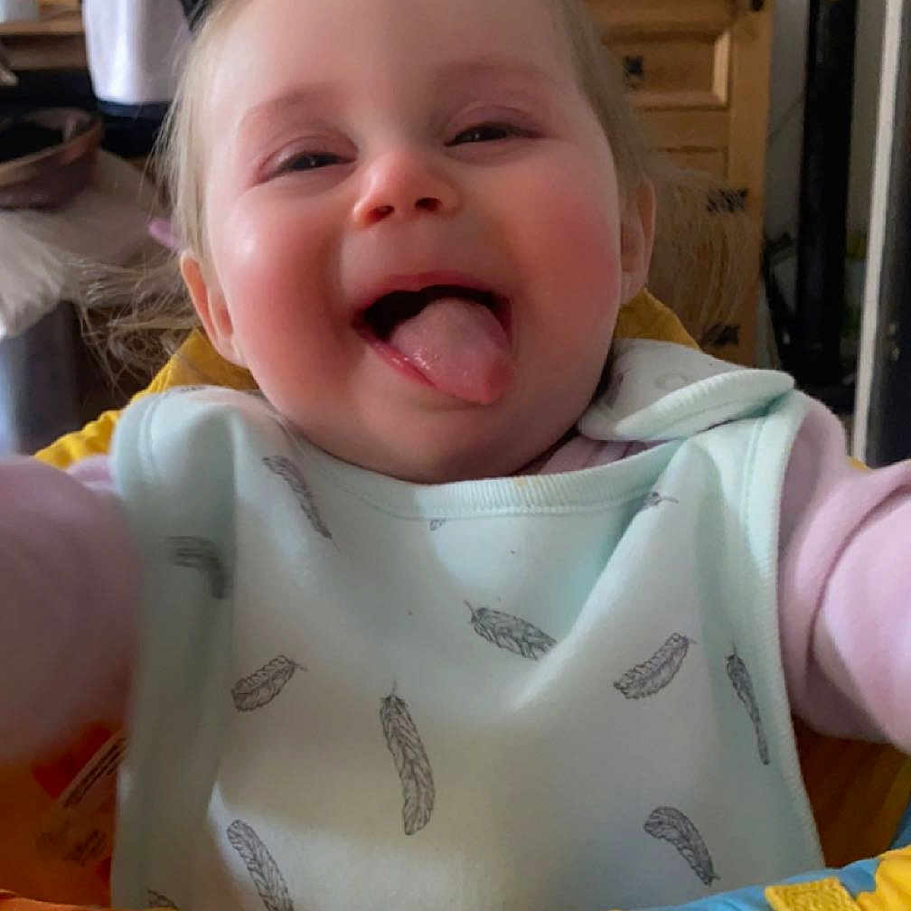 Autumn is registered to the contest to win money with this photo: baby, babylaughing, bodypart, clothing, cushion, cutlery, face, furniture, happy, head, indoors, laughing, mouth, person, photography, portrait, smile, spoon, t_shirt, teeth