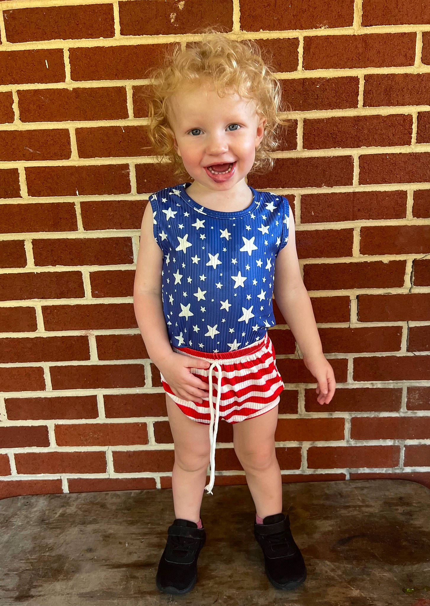 Salem joined the competition — help win amazing prizes! baby_toddler_clothing, brick, brickwork, dress, eye, face, flash_photography, hair, hairstyle, happy, head, human_body, knee, outerwear, person, sleeve, smile, standing, street_fashion, t_shirt