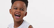 Zaiden is registered to the contest to win money with this photo: boy, casual_clothing, child, curly_hair, cute, expressive, face, happy, head_and_shoulders, innocent, joyful, laugh, portrait, positive_emotion, short_sleeves, smile, studio_photo, teeth, white_background, young