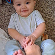 Serenity joined the competition — help win amazing prizes! baby, child, smiling, hand, foot, carpet, toy, indoor, person, holding, playful, cute, infant, sitting, closeup, skin, clothing, interaction, happy, young