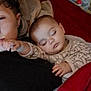 baby, sleeping, adult, blanket, bed, cuddle, face, hand, indoor, person, pajamas, rest, soft, toddler, warm, young_child, comfort, clothing, lying_down, family